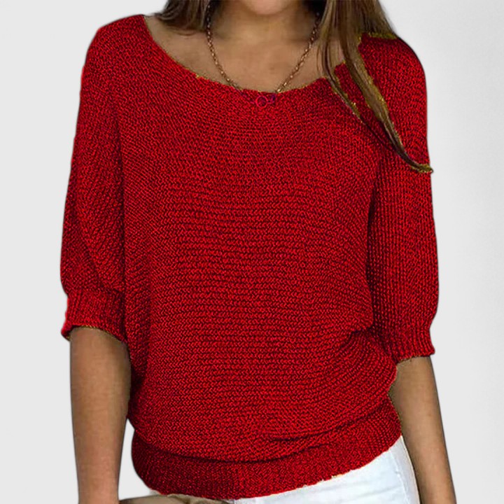 Women's textured knit pullover with round neckline and three-quarter sleeves