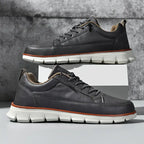 Low top lace-up sneaker with stitched panels and chunky textured sole