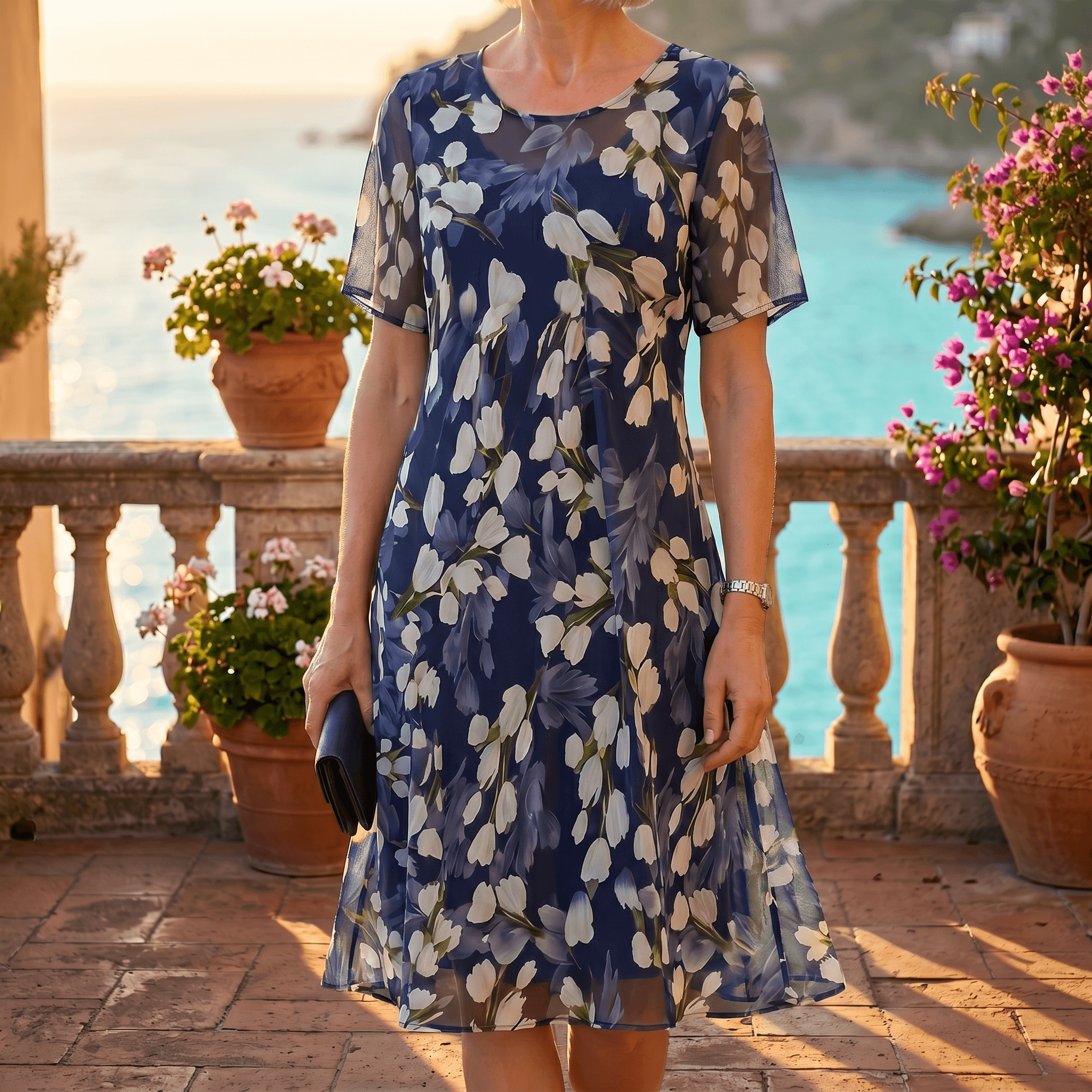 Women's navy floral A-line midi dress with round neckline and short sleeves