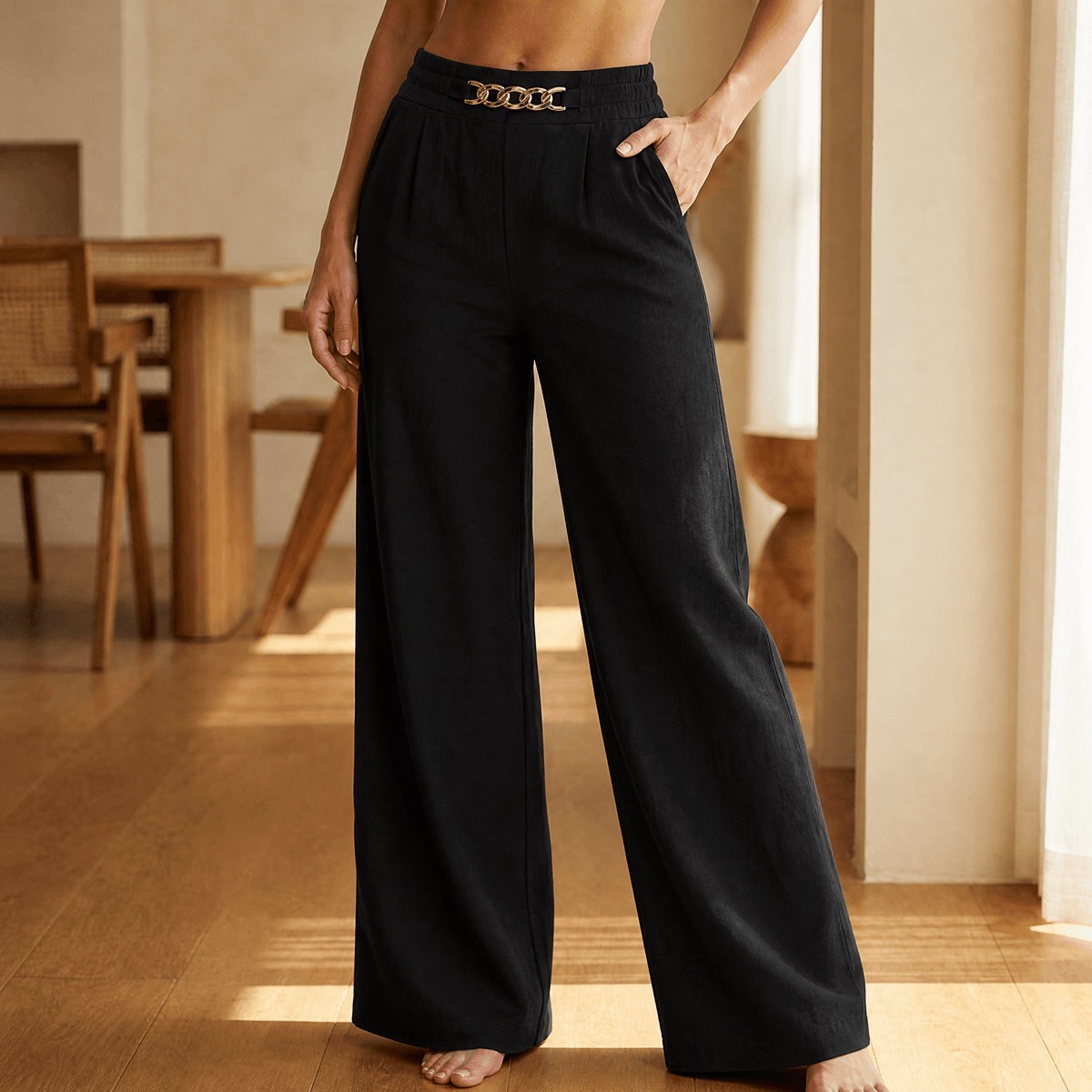 Women's high-waisted wide leg trousers with front chain detail and side pockets