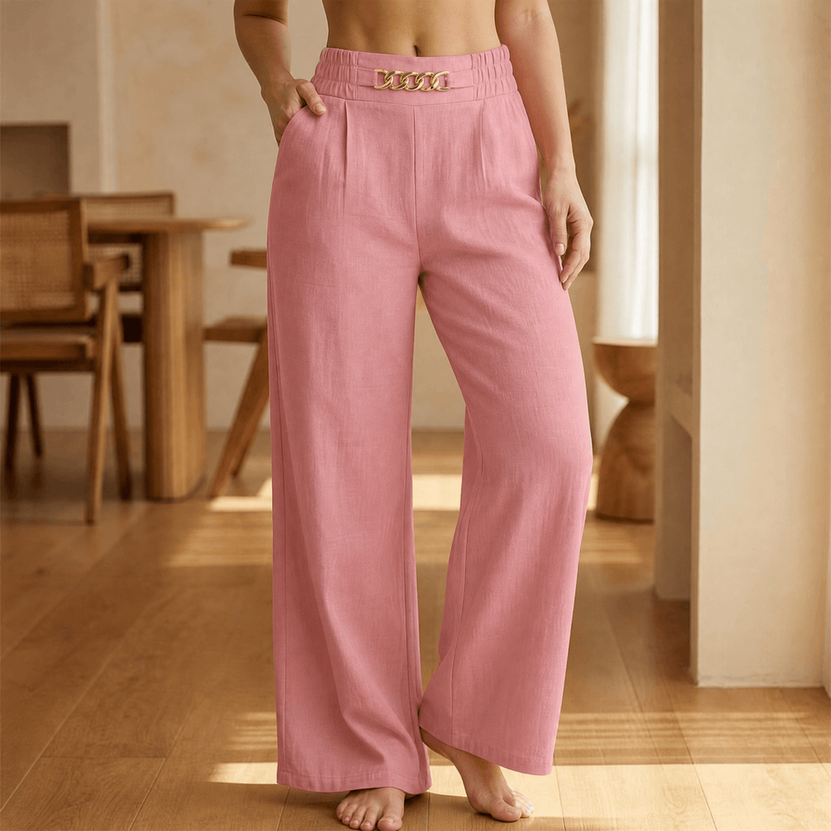 Women's high-waisted wide leg trousers with front chain detail and side pockets