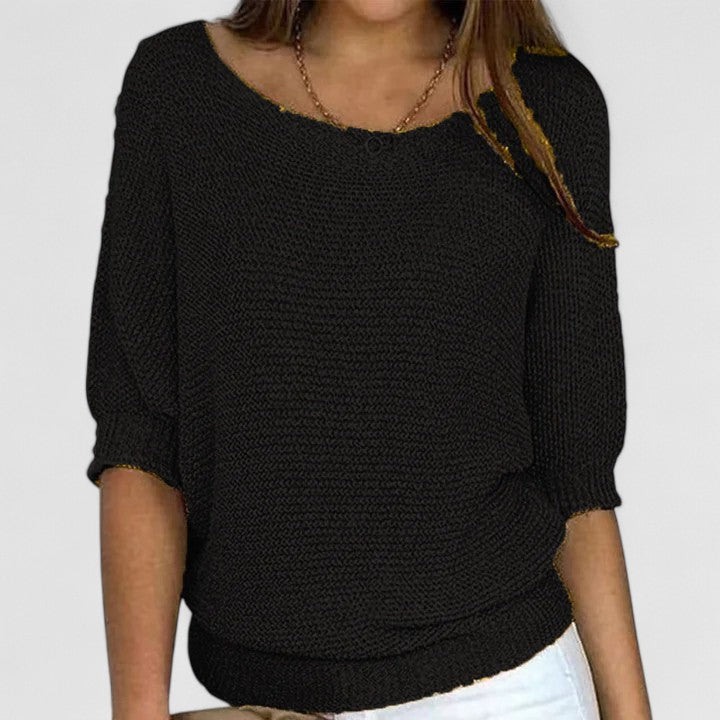 Women's textured knit pullover with round neckline and three-quarter sleeves