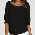 Women's textured knit pullover with round neckline and three-quarter sleeves