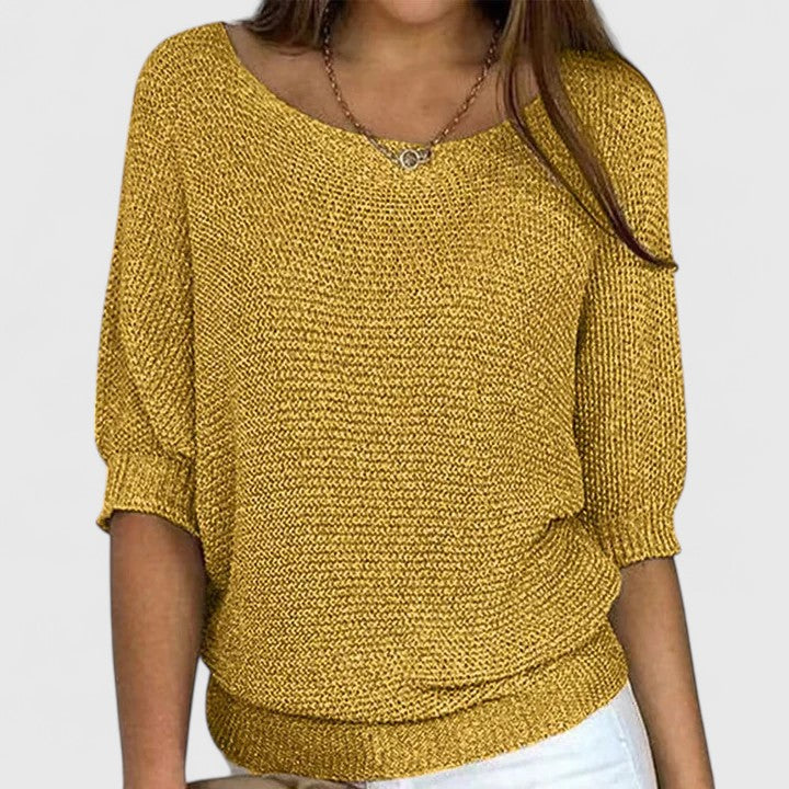 Women's textured knit pullover with round neckline and three-quarter sleeves