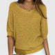 Women's textured knit pullover with round neckline and three-quarter sleeves