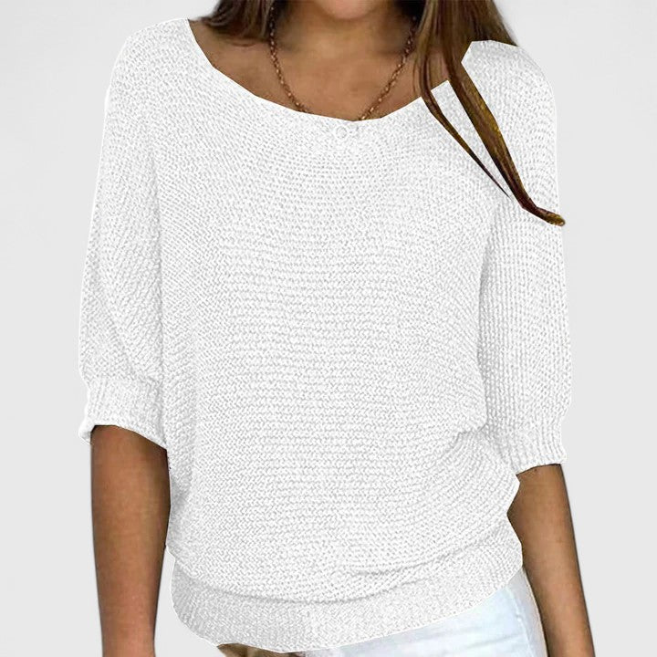 Women's textured knit pullover with round neckline and three-quarter sleeves