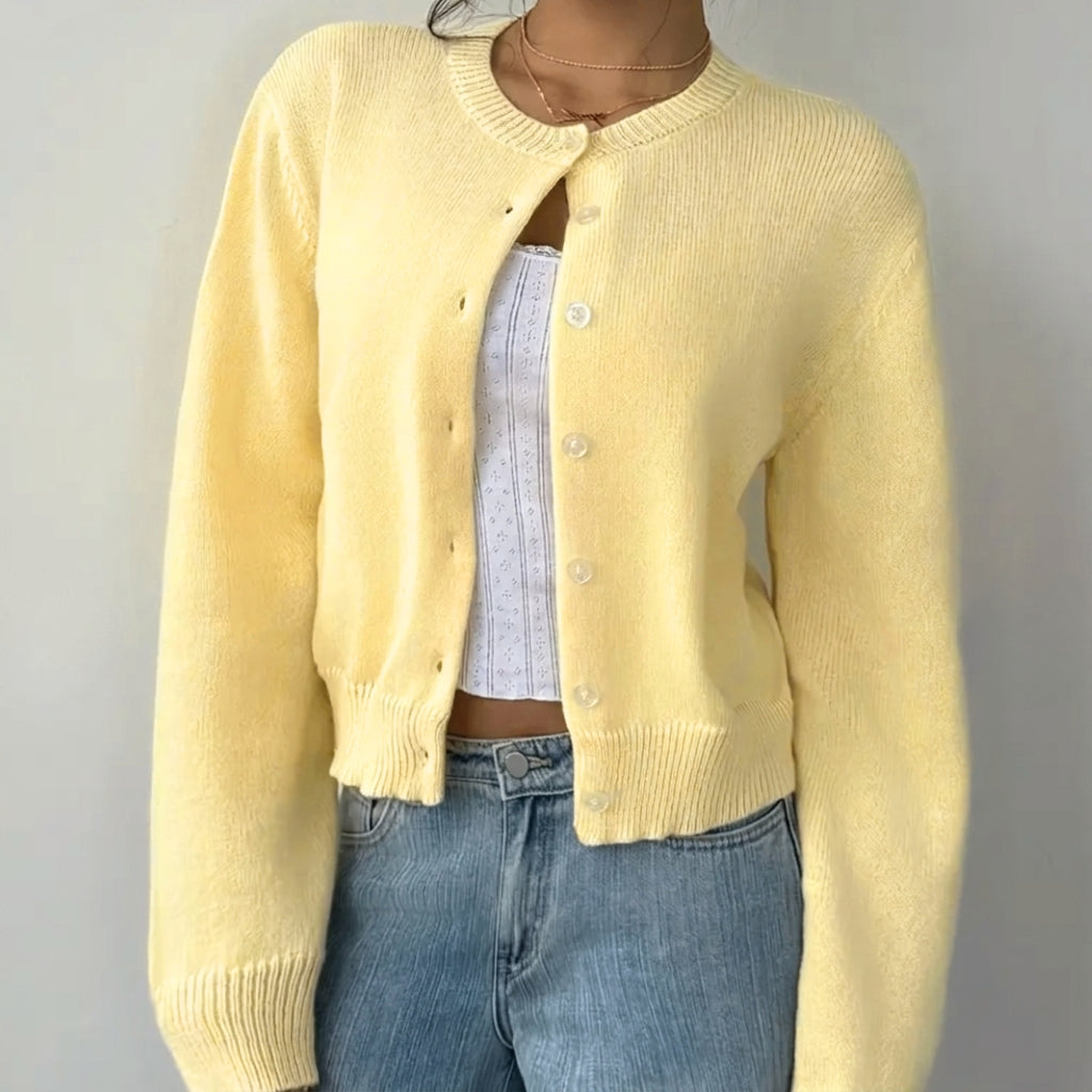 Women's cropped ribbed cardigan with round neckline, long sleeves and button front