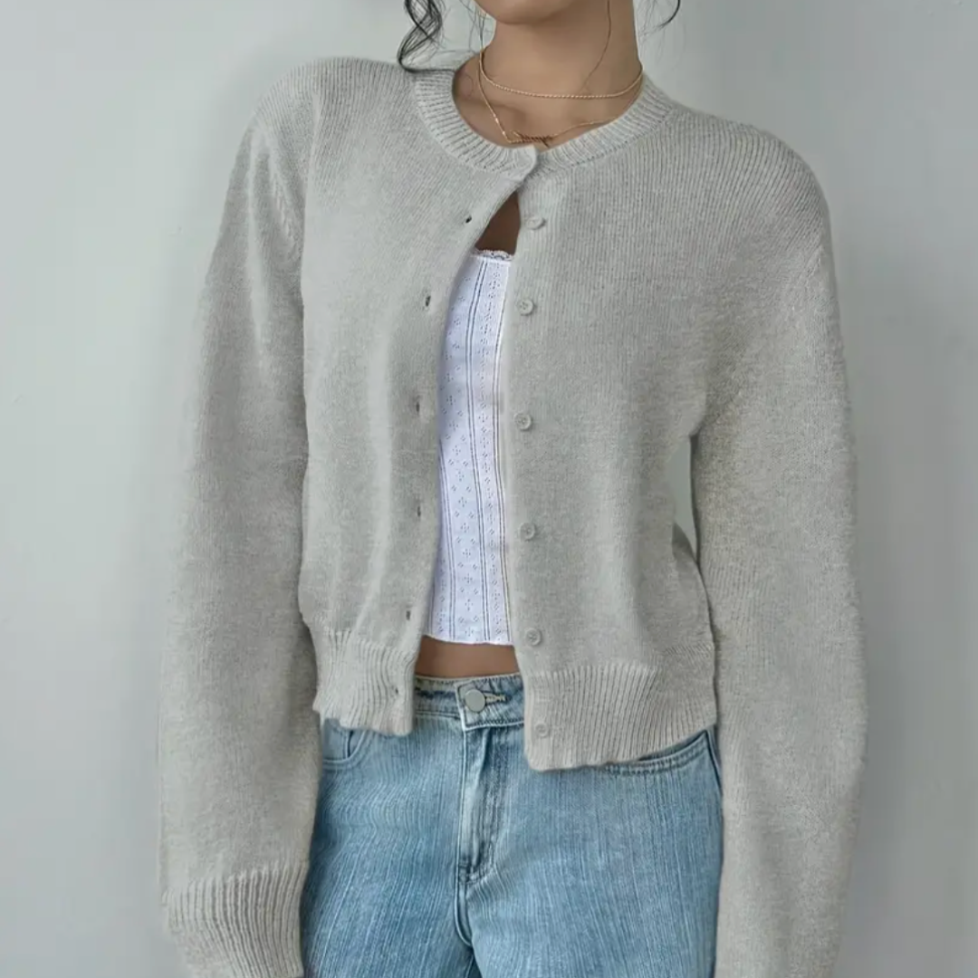 Women's cropped ribbed cardigan with round neckline, long sleeves and button front