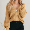 Women's chunky knit V-neck cardigan with button front and balloon sleeves