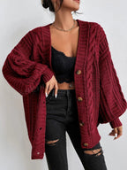 Women's oversized cable knit cardigan with V-neck, buttons and long sleeves