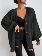 Women's oversized cable knit cardigan with V-neck, buttons and long sleeves