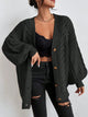 Women's oversized cable knit cardigan with V-neck, buttons and long sleeves
