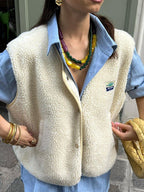 Women's textured sleeveless buttoned vest