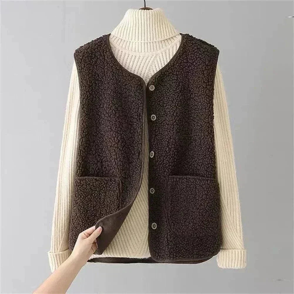Women's sleeveless textured vest with V-neck, buttons and patch pockets