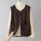 Women's sleeveless textured vest with V-neck, buttons and patch pockets