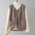 Women's sleeveless textured vest with V-neck, buttons and patch pockets