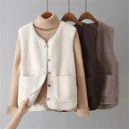 Women's sleeveless textured vest with V-neck, buttons and patch pockets