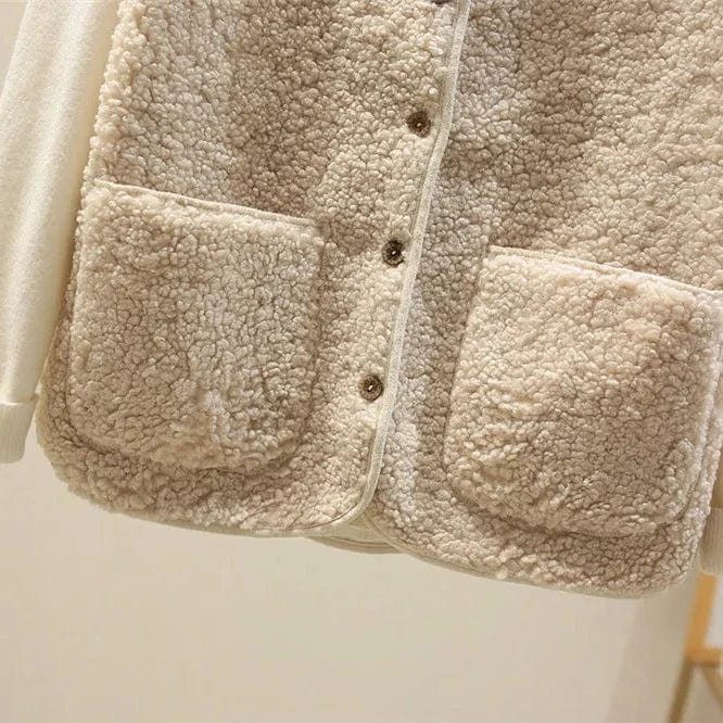 Women's sleeveless textured vest with V-neck, buttons and patch pockets