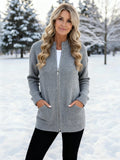 Women's long ribbed knit cardigan with stand collar, zip fastening and front pockets