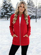 Women's long ribbed knit cardigan with stand collar, zip fastening and front pockets