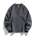 Men's textured knit cardigan with V-neck, zip front and patch pockets