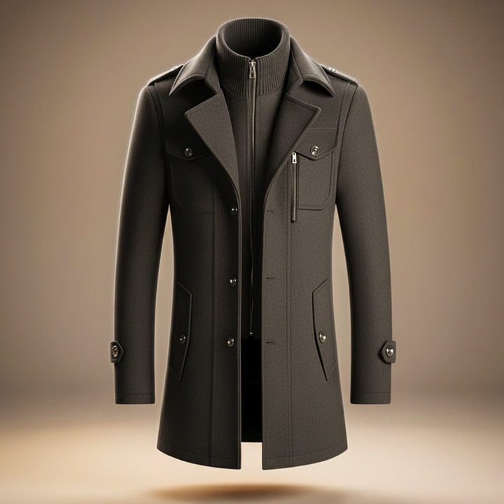 Men's structured long coat with high collar, zip and button front, and multiple pockets