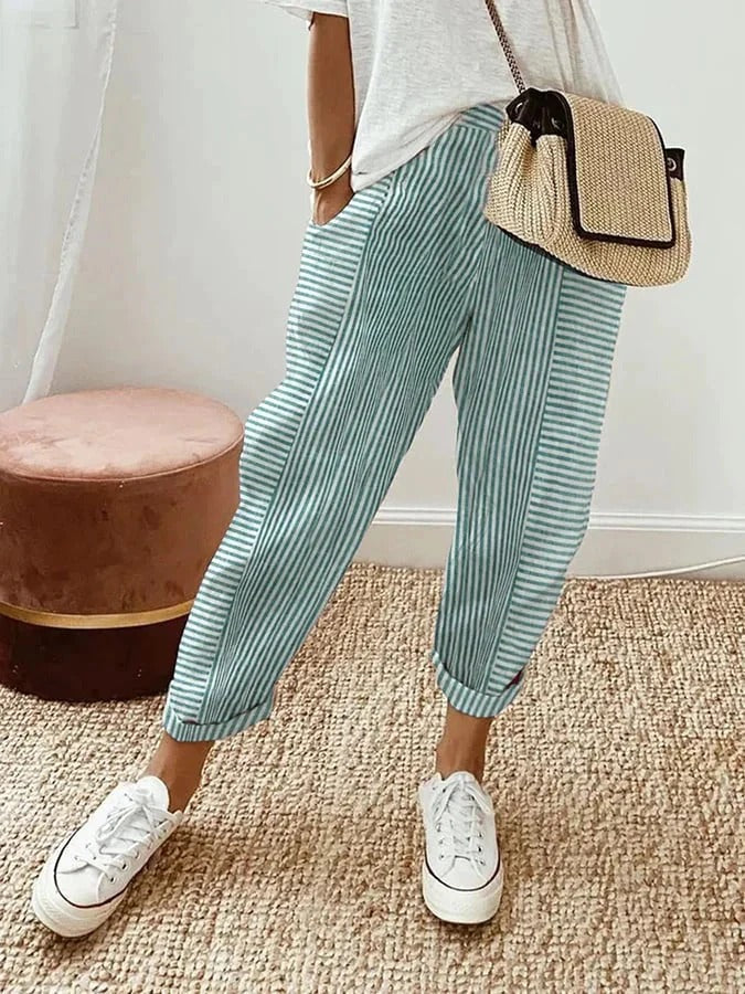 Women's cropped striped trousers with elastic waist and cuffed hems
