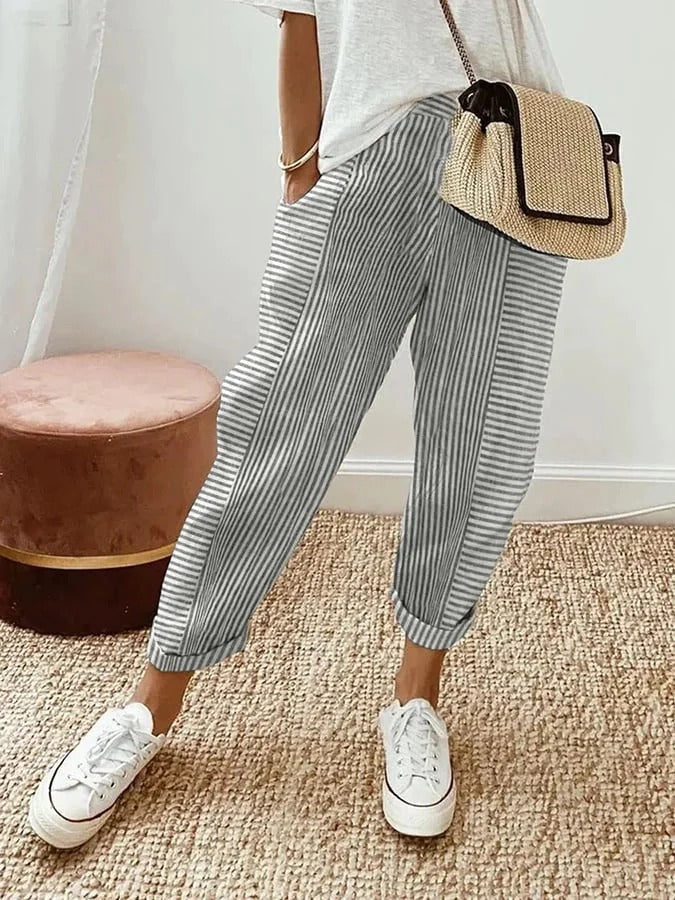 Women's cropped striped trousers with elastic waist and cuffed hems