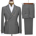 Men's two-piece suit with notched lapels, chain detail, buckle accents and matching trousers