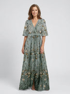 Women's green floral maxi dress with V-neck and short sleeves