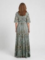 Women's green floral maxi dress with V-neck and short sleeves