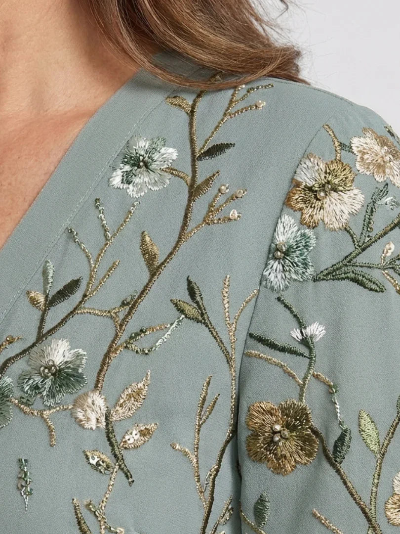 Women's green floral maxi dress with V-neck and short sleeves