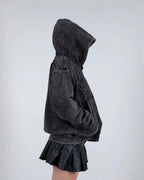 Black hoodie with embroidered front and back graphics