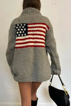 Women's knit sweater with high neck and stars and stripes flag motif