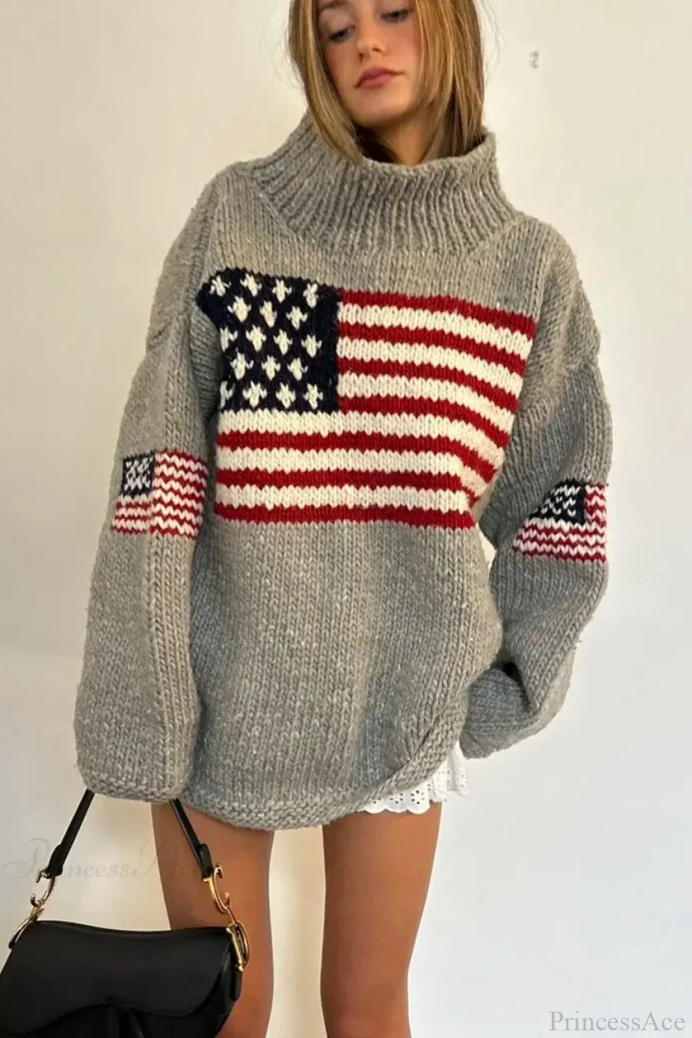 Women's knit sweater with high neck and stars and stripes flag motif