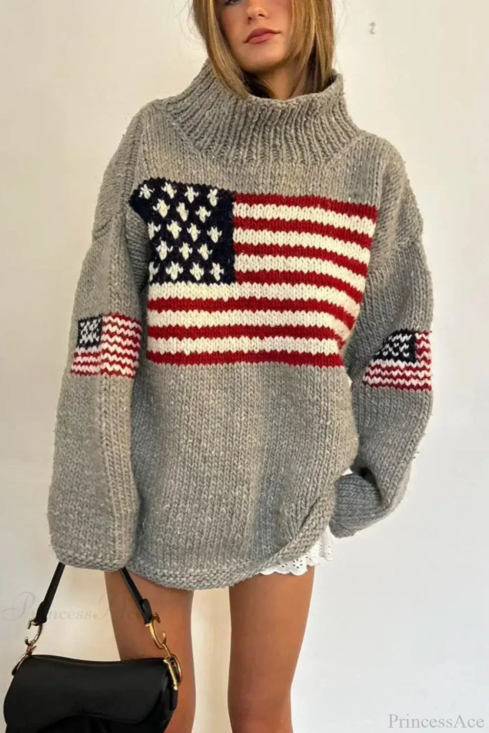 Women's knit sweater with high neck and stars and stripes flag motif