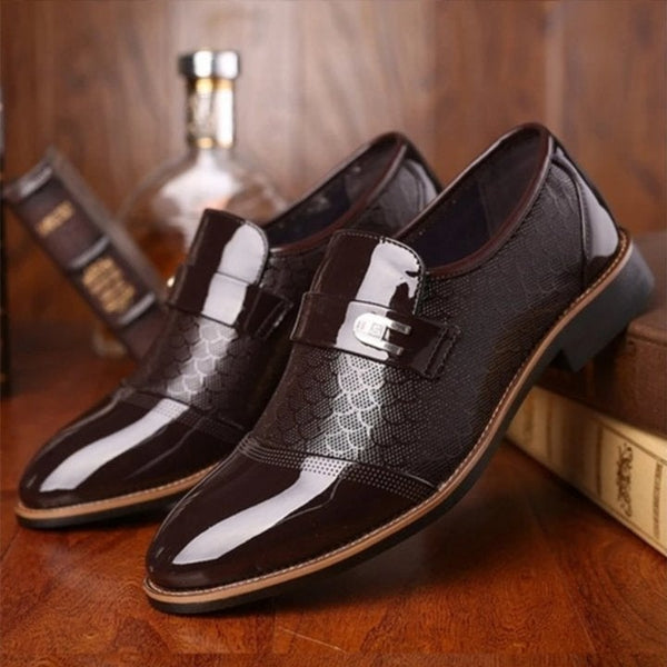 Men's patterned loafers with buckle straps and contrast stripe detailing