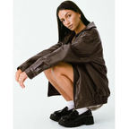 Women's oversized faux leather jacket with wide collar and zip front