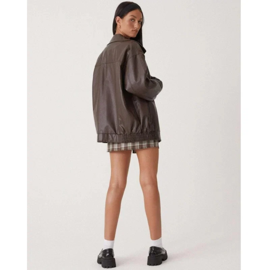 Women's oversized faux leather jacket with wide collar and zip front