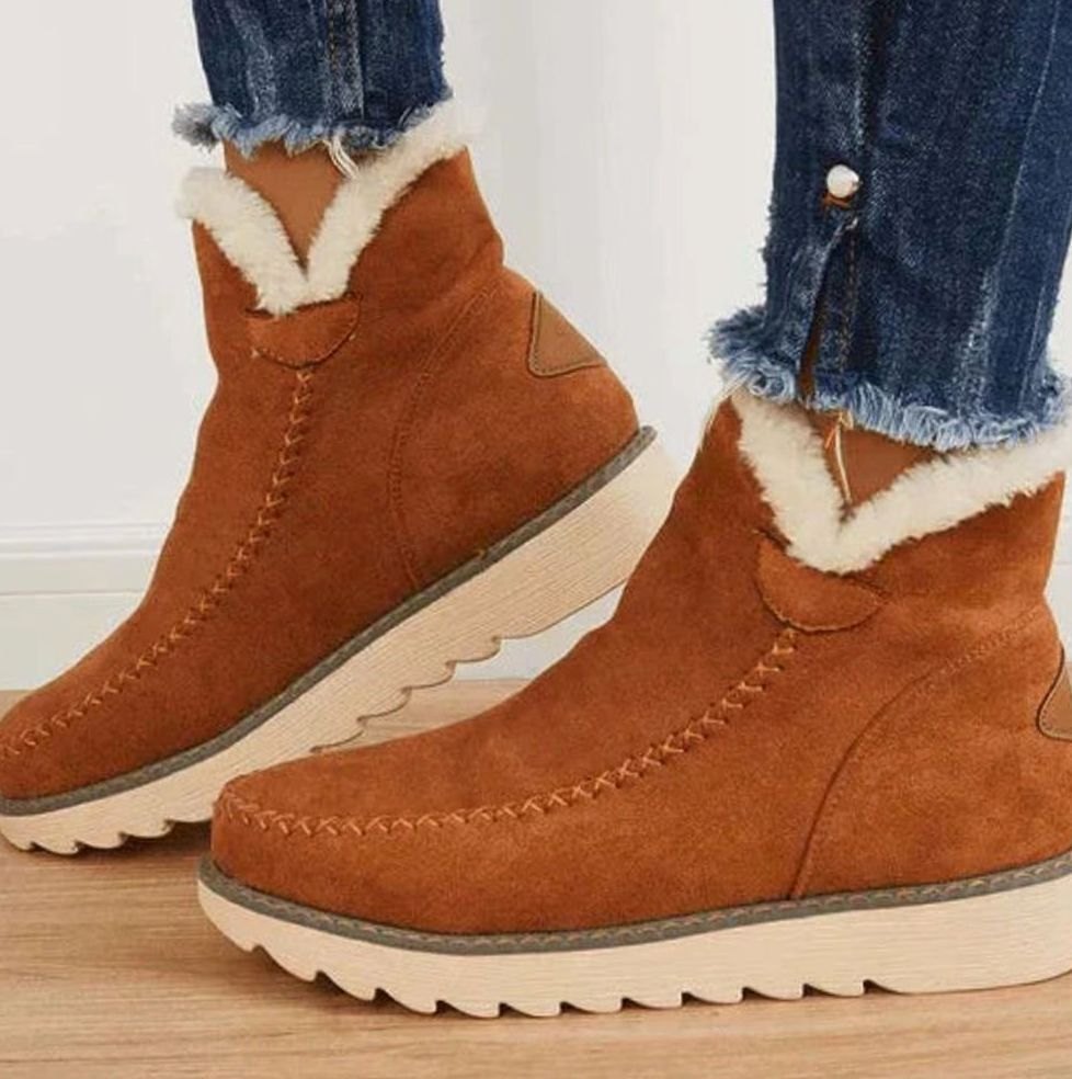 Women's ankle boots with faux-fur trim, stitched panels and flat lugged soles