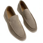 Round-toe men's slip-on loafers with light-coloured soles