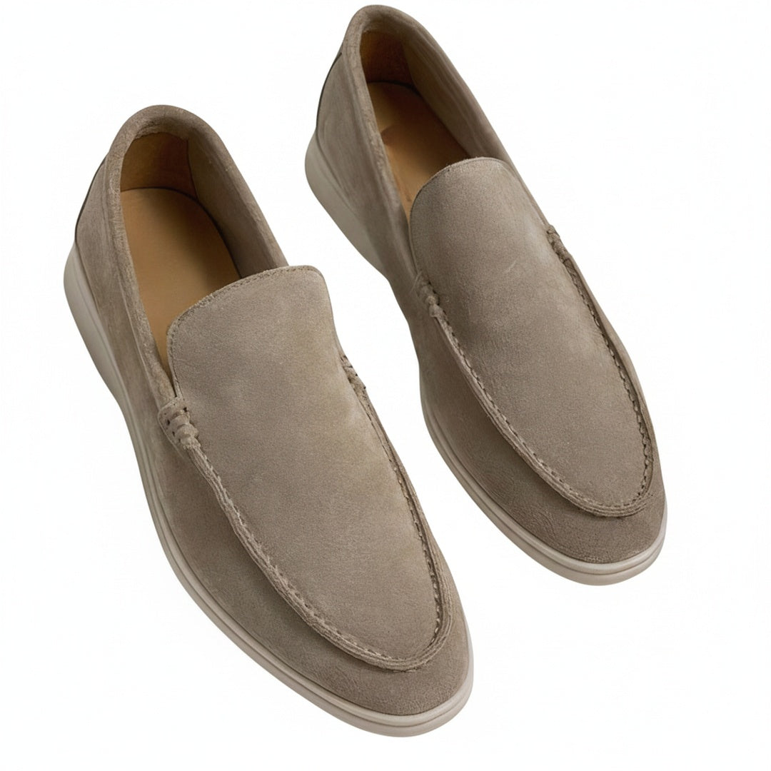 Round-toe men's slip-on loafers with light-coloured soles
