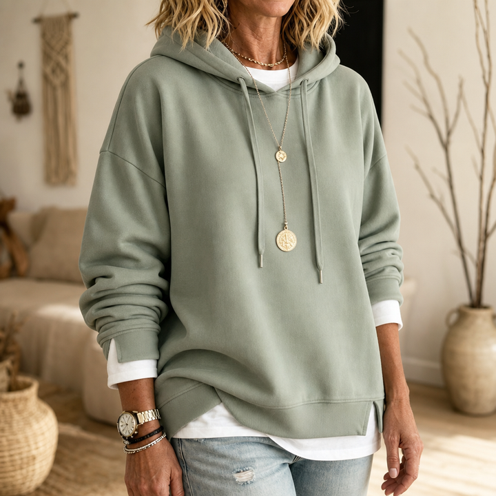 Women's layered two-tone hem hoodie with drawstring hood and long sleeves