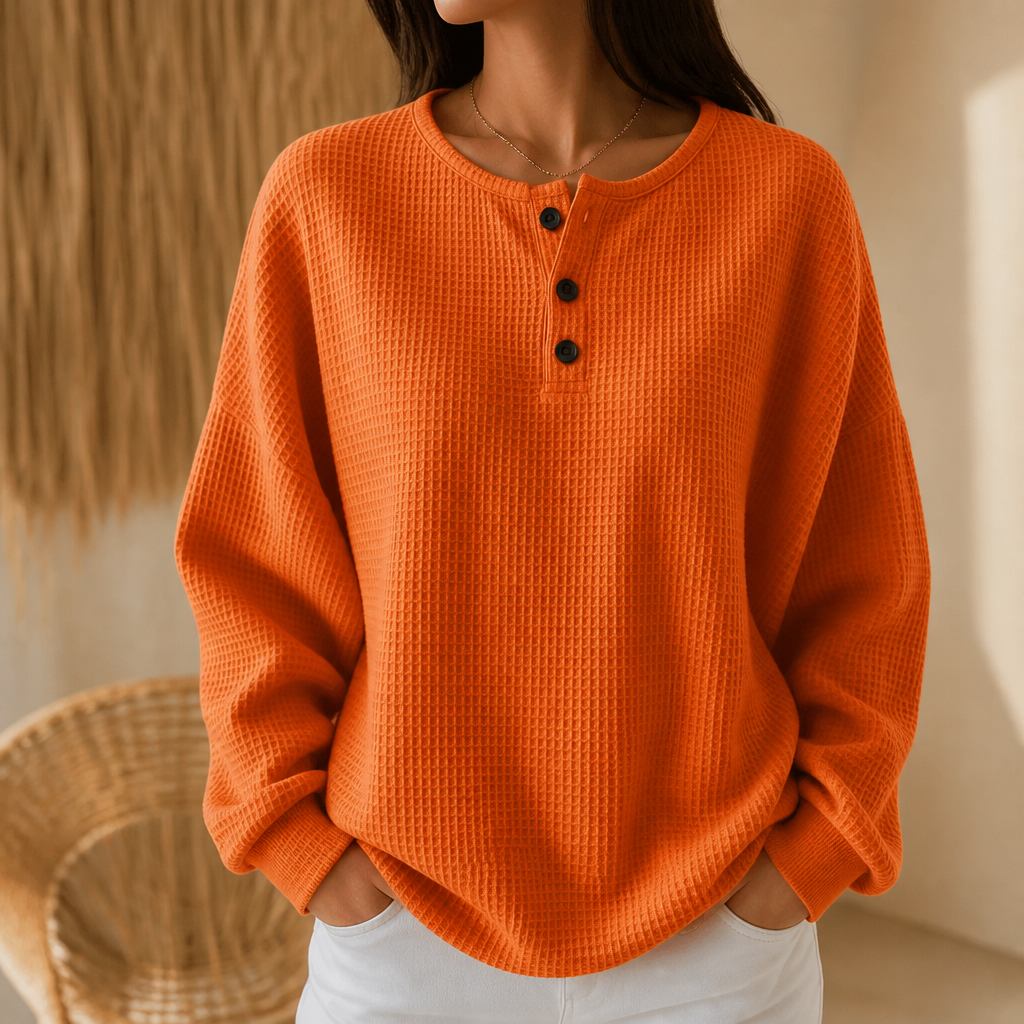 Women's waffle knit henley top with long sleeves and button placket