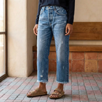 Women's cropped straight leg jeans with distressed details and frayed hems