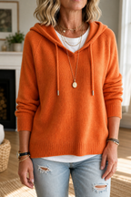 Women's hooded ribbed knit pullover with drawstrings and long sleeves