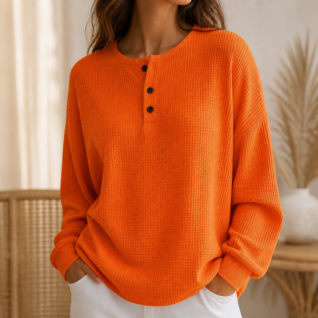 Women's waffle knit henley top with long sleeves and button placket