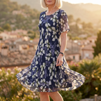 Women's navy floral A-line midi dress with round neckline and short sleeves
