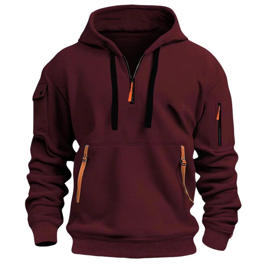 Men's hooded half-zip pullover with multiple zip pockets