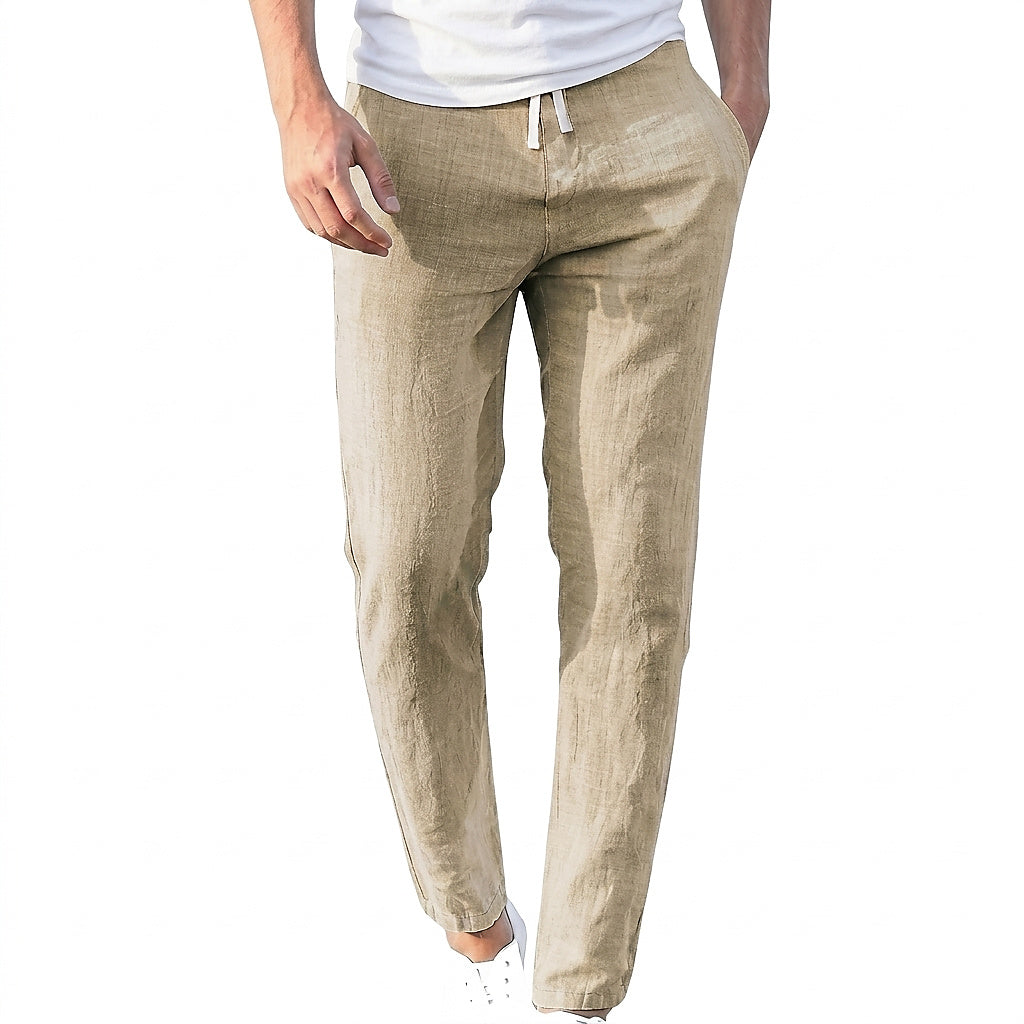 Men's beige relaxed-fit trousers with drawstring waist and flat front, full-length view.